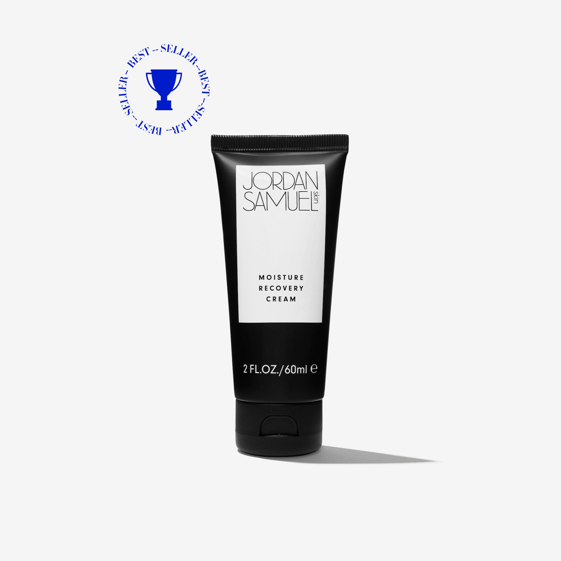 Black tube of Jordan Samuel Moisture Recovery Cream on a white background with circular blue "best seller" icon in upper left corner