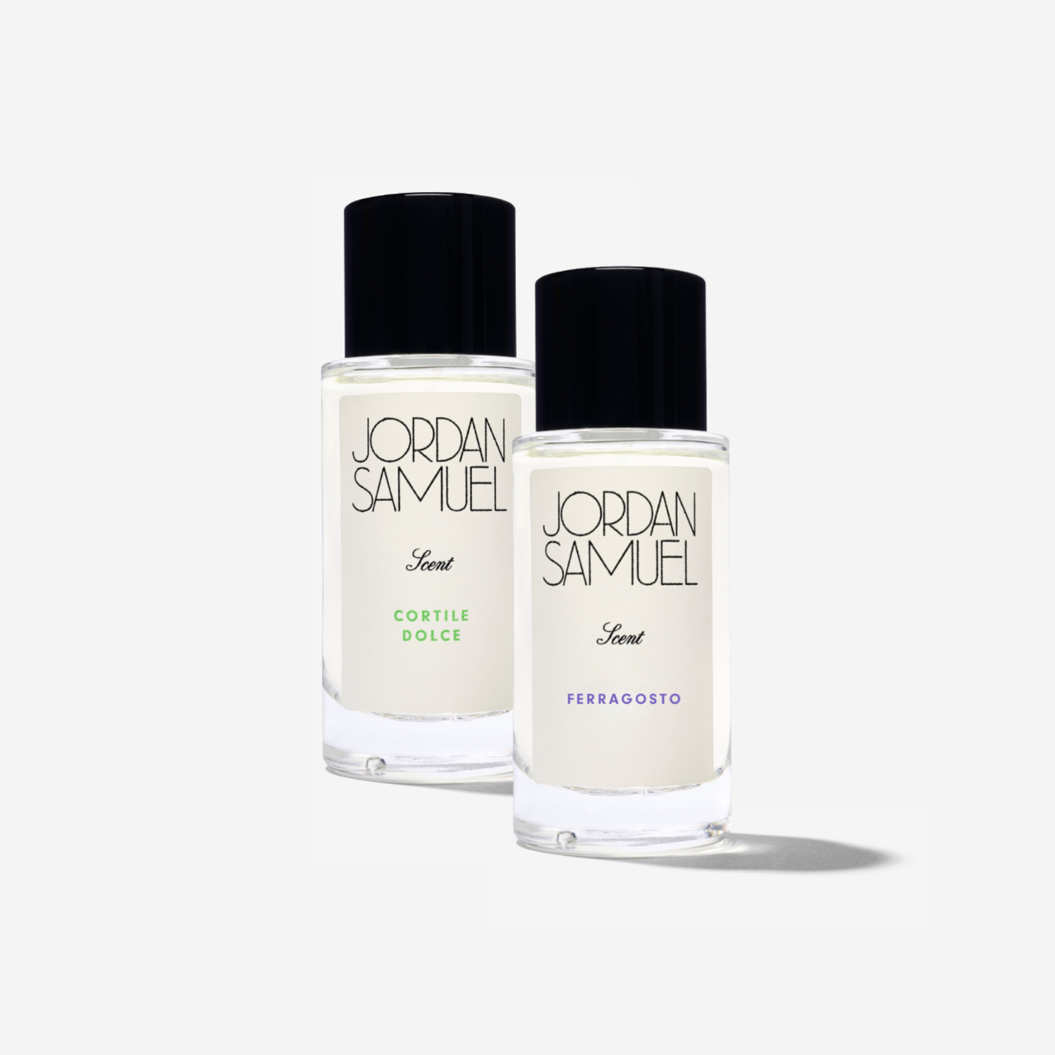 Two Jordan Samuel perfume bottles - Cortile Dolce and Ferragosto - on a white background